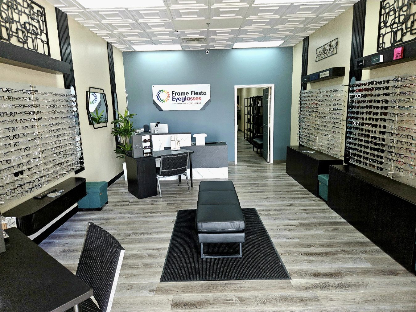 The reception desk and logo wall inside the Dallas store.